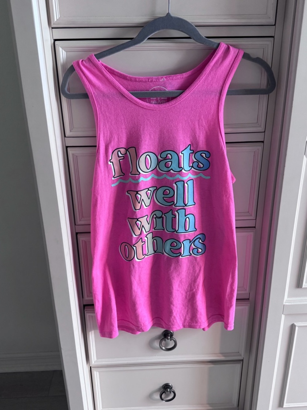 Pink woman's tank floats well with others